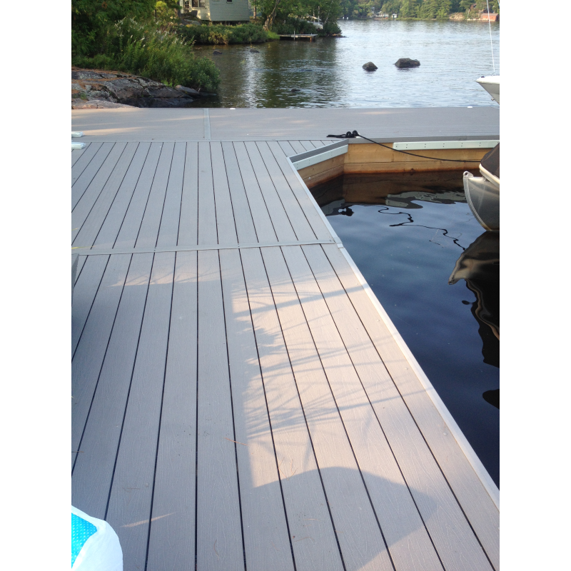 TruNorth Enviroboard 5/4 in. x 5-1/2 in. x 12 ft. Stone Grey Grooved Composite Deck Boards